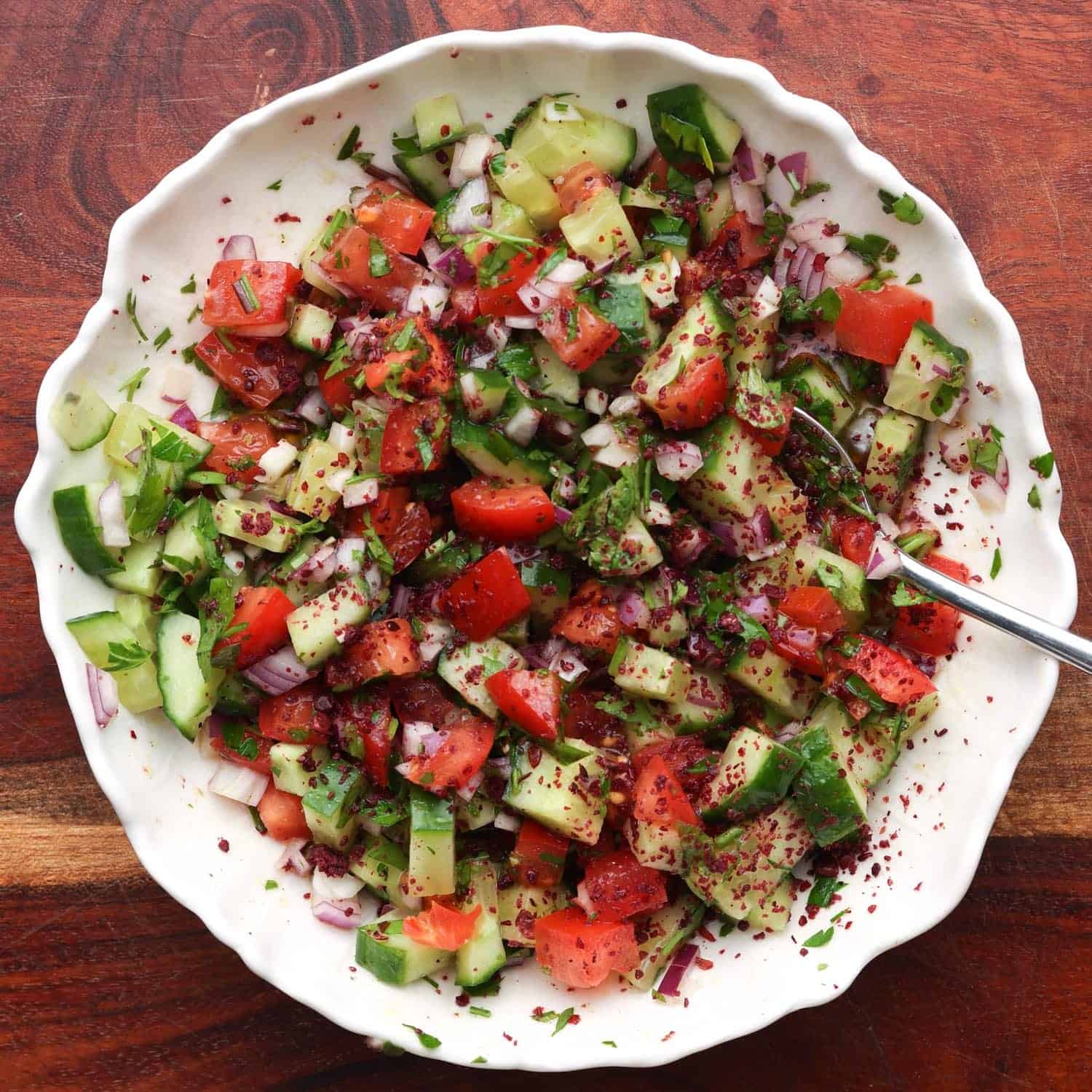 shirazi salad in a white bowl. 