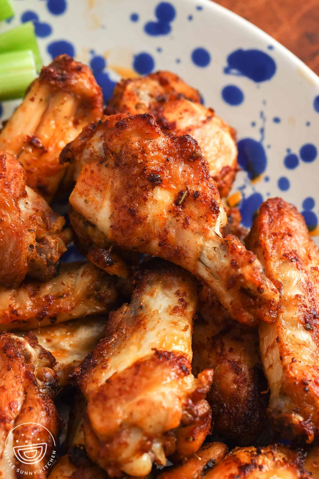 closeup of chicken wings fried in an air fryer without sauce.