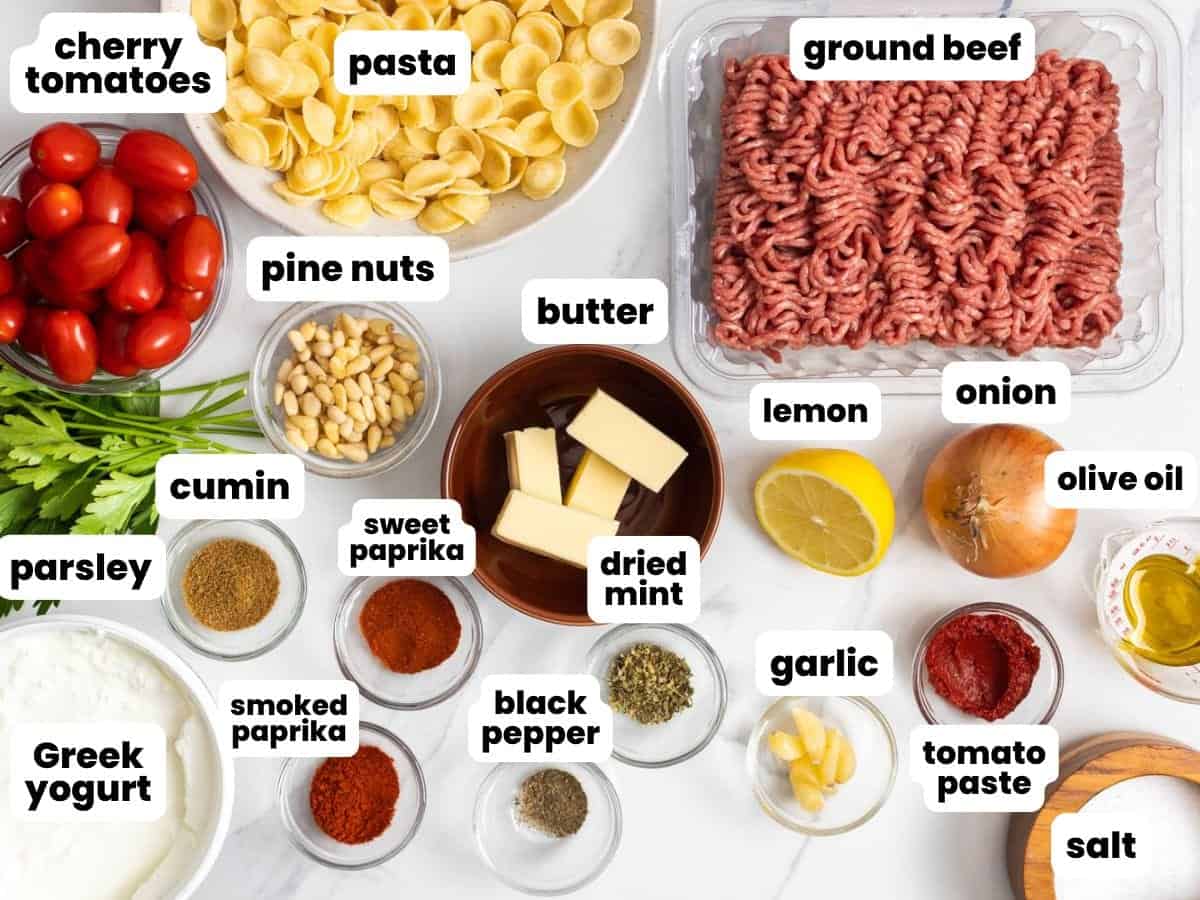 Turkish pasta ingredients, including ground beef, dried mint, and pine nuts.