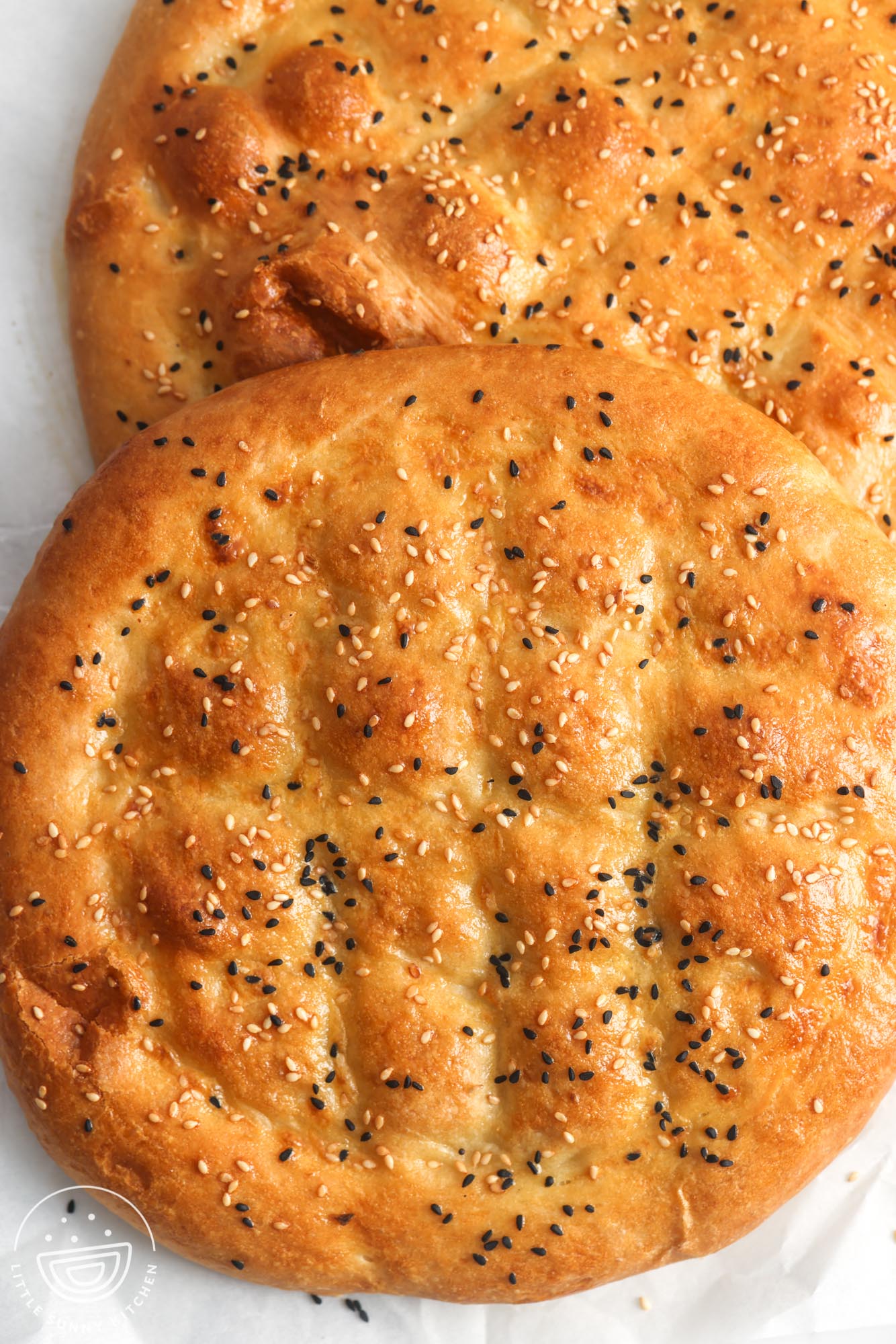 two round loaves of turkish flatbread for ramadan