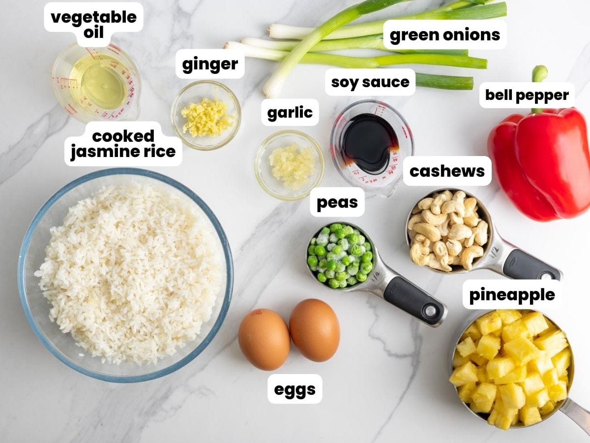 The ingredients needed to make homemade thai pineapple fried rice.